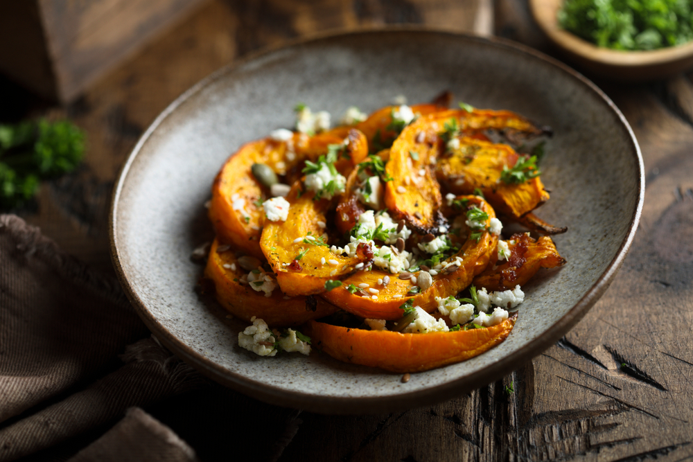 Roasted squash and feta cheese in a grey bowl in an article about restaurants in Springfield MO