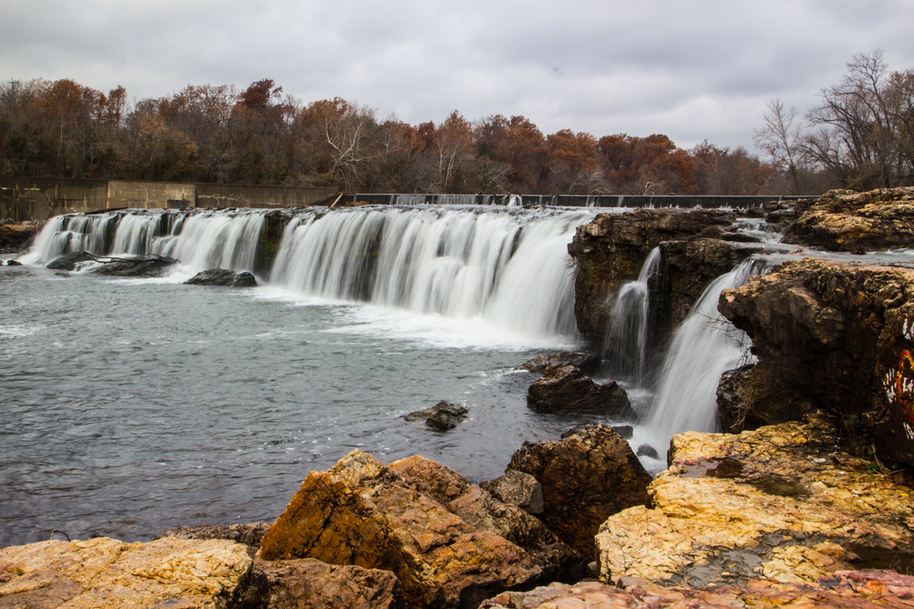 Side view of Grand Falls on a cloudy day.