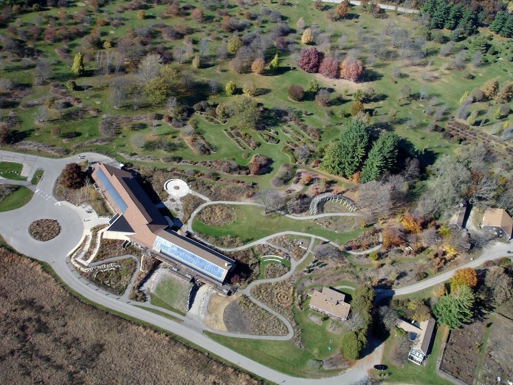 Aerial view of the University of Wisconsin Arboretum showing trees and trails. 