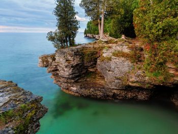 Hiking in Wisconsin showcases lakes and rock formations.