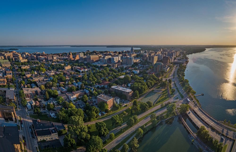 aerial view of city with trees and water restaurants in madison wi