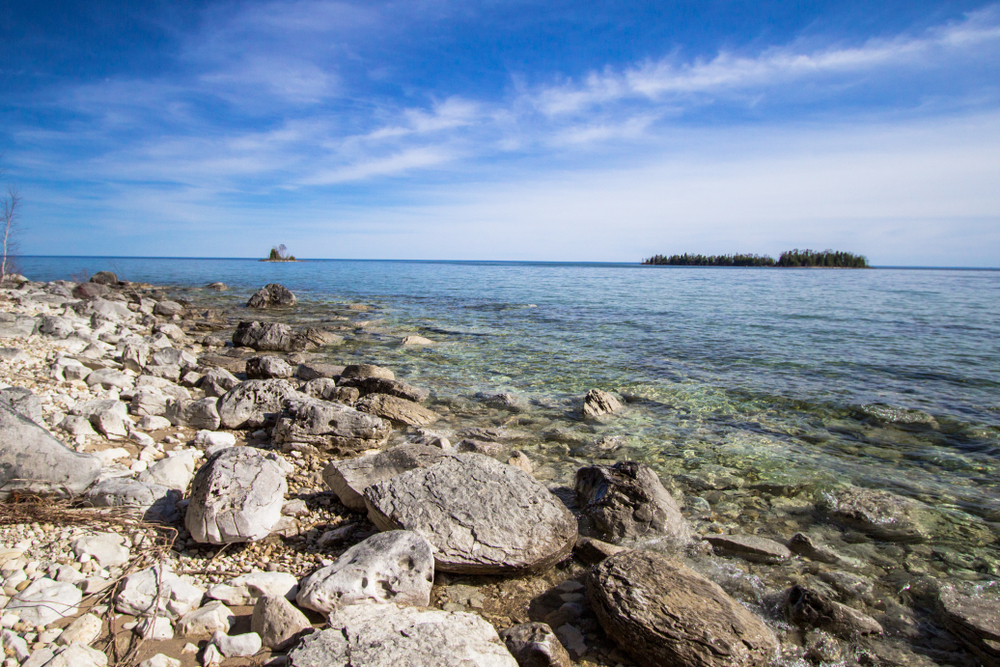 Close-up of the rocky shore of one of the Les Cheneaux Islands in the Great Lakes.