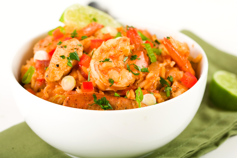 Close up shot of shrimp and vegetables in white bowl served at the best places to eat in South Bend IN.