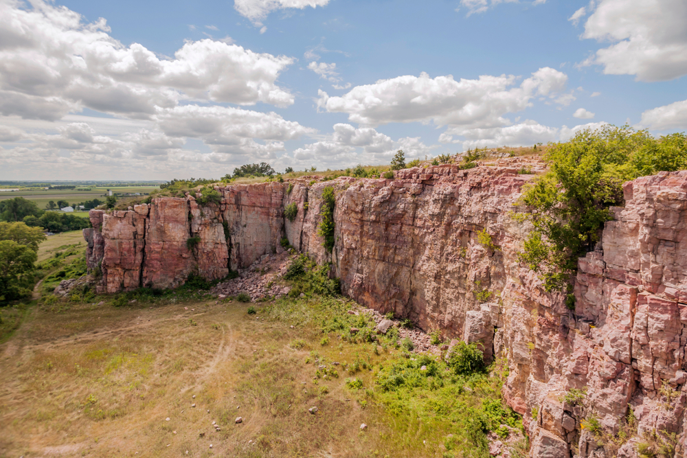 Aerial view of the pink cliffs at Blue Mounds State Park.