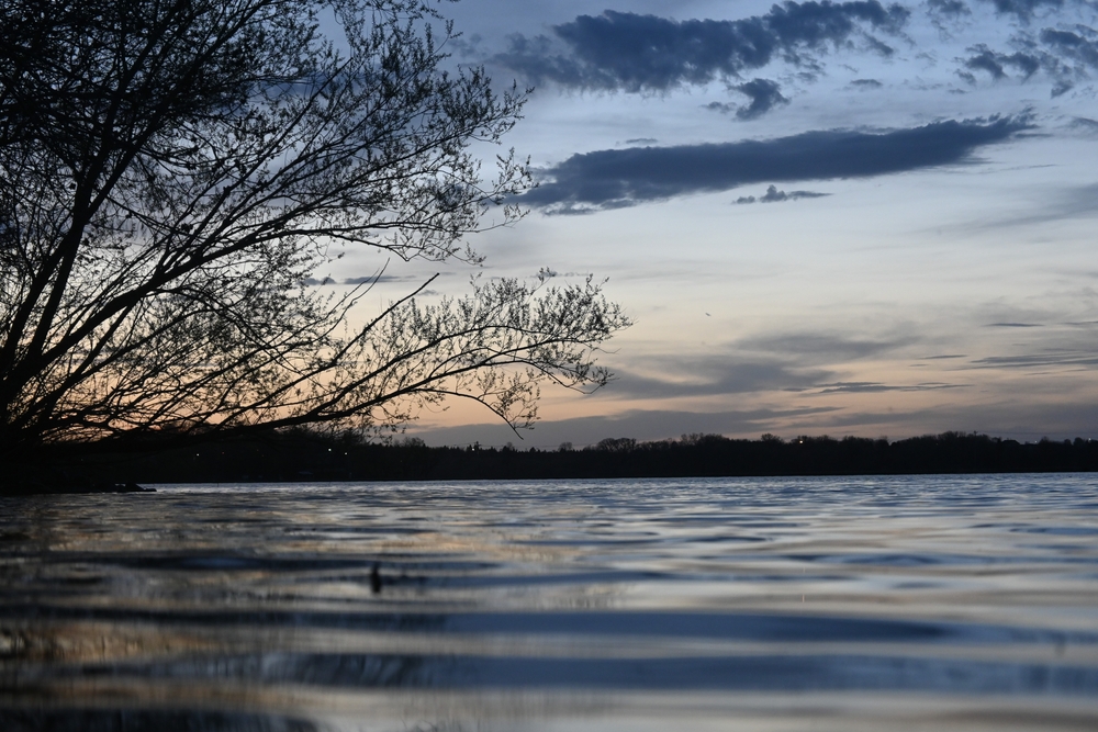 Low angle shot of dusk falling over one of the lakes on the Glacial Lakes State Trail.