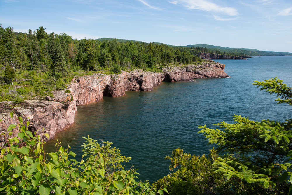 View through foliage and across the water to Shovel Point.