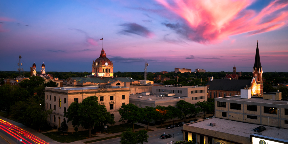 The skyline of Green Bay with sunset at the background. 