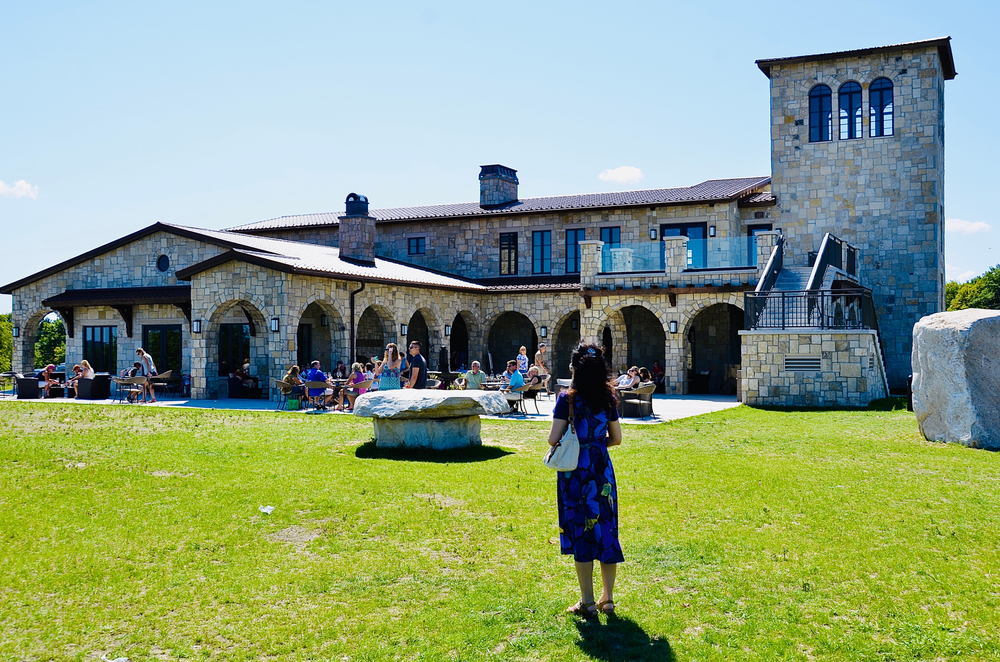 People enjoying the wine tastings, relaxing atmosphere and beautiful view at the famous Mari Vineyards, on Old Mission Peninsula, Traverse City.