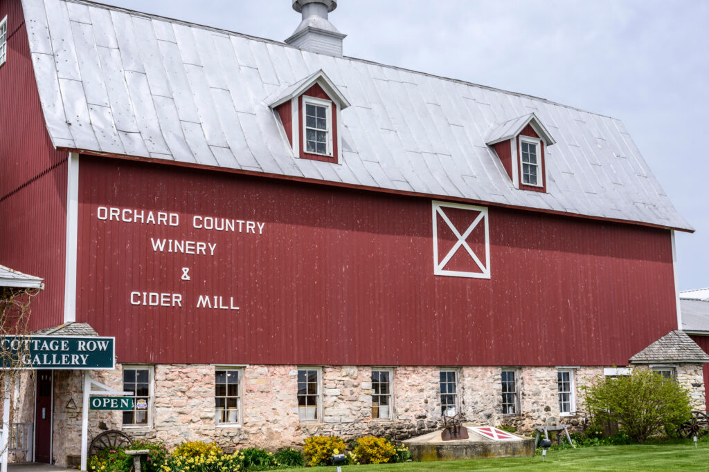 Orchard Country Winery and Cider Mill, Fish Creek, Door County, Wisconsin. One if the wineries in Wisconsin in a red barn. 