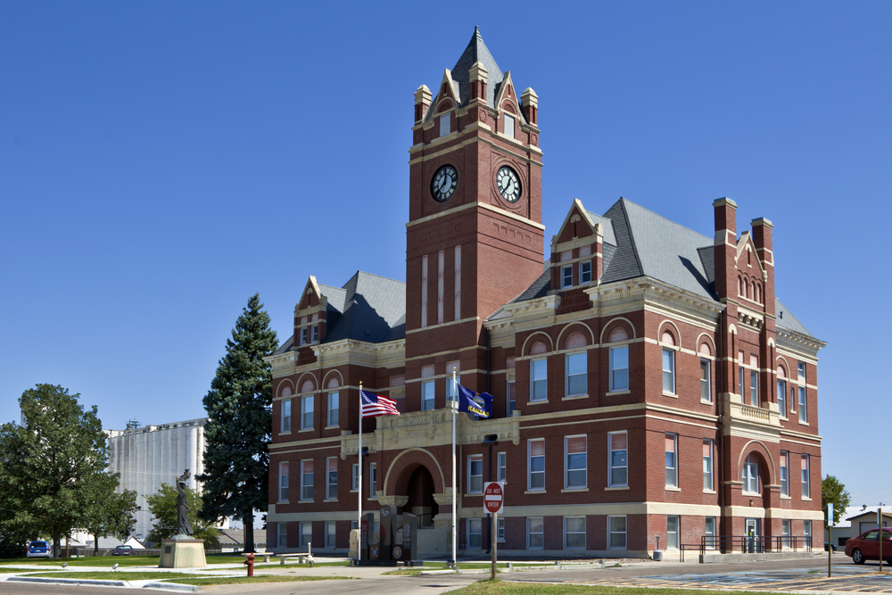 Red brick courthouse with a clock tower in Colby, one of the cutest towns in Kansas.