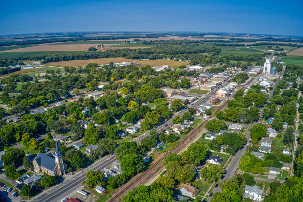 Aerial view of St. Marys with lots of trees and a church.