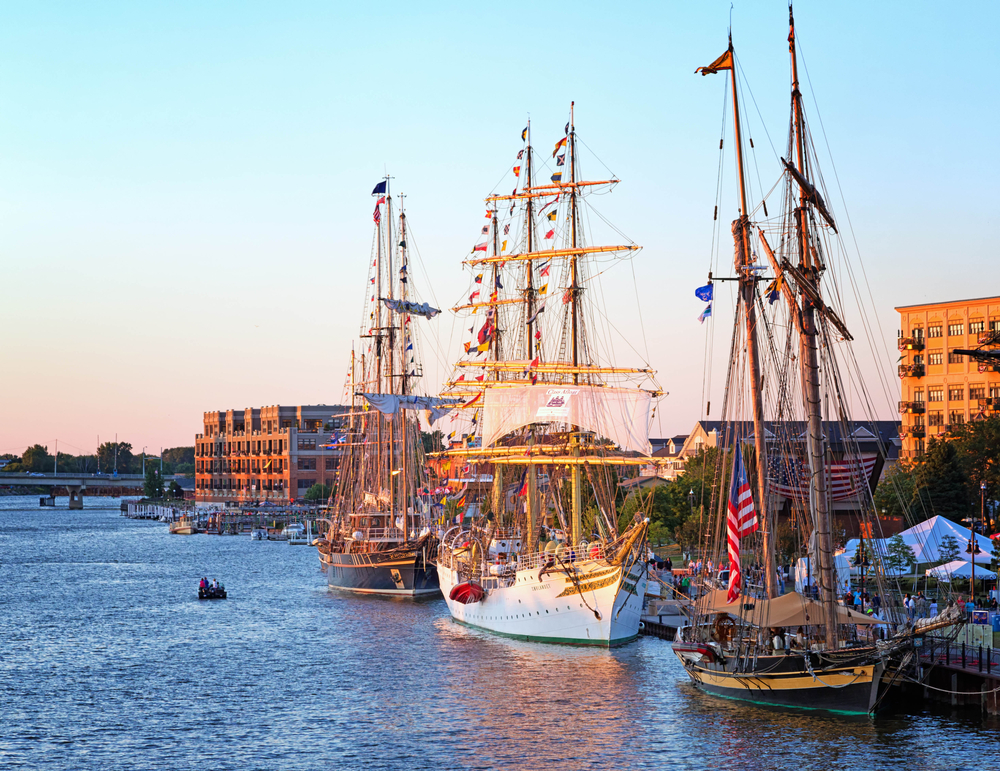 Masted ships sit docked at Wenonah Park during the Tall Ship Celebration in Bay City, MI.