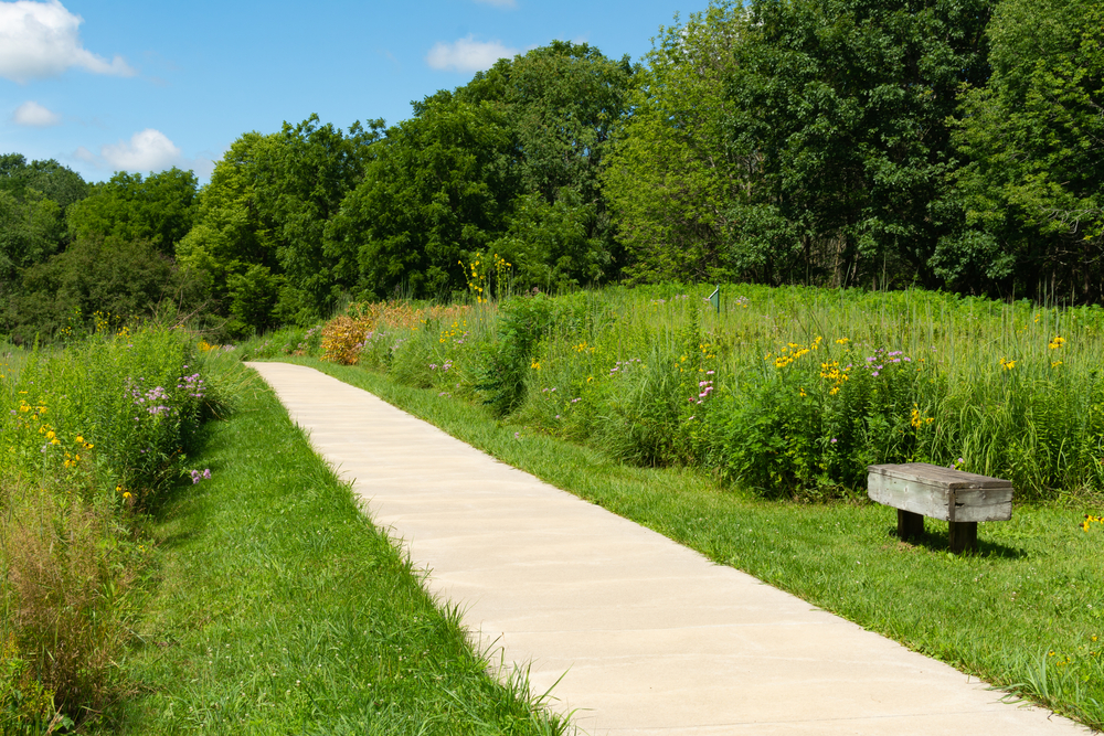 Pathway leading to butterfly garden on a beautiful Summer morning. This is one of the places to go camping in Iowa