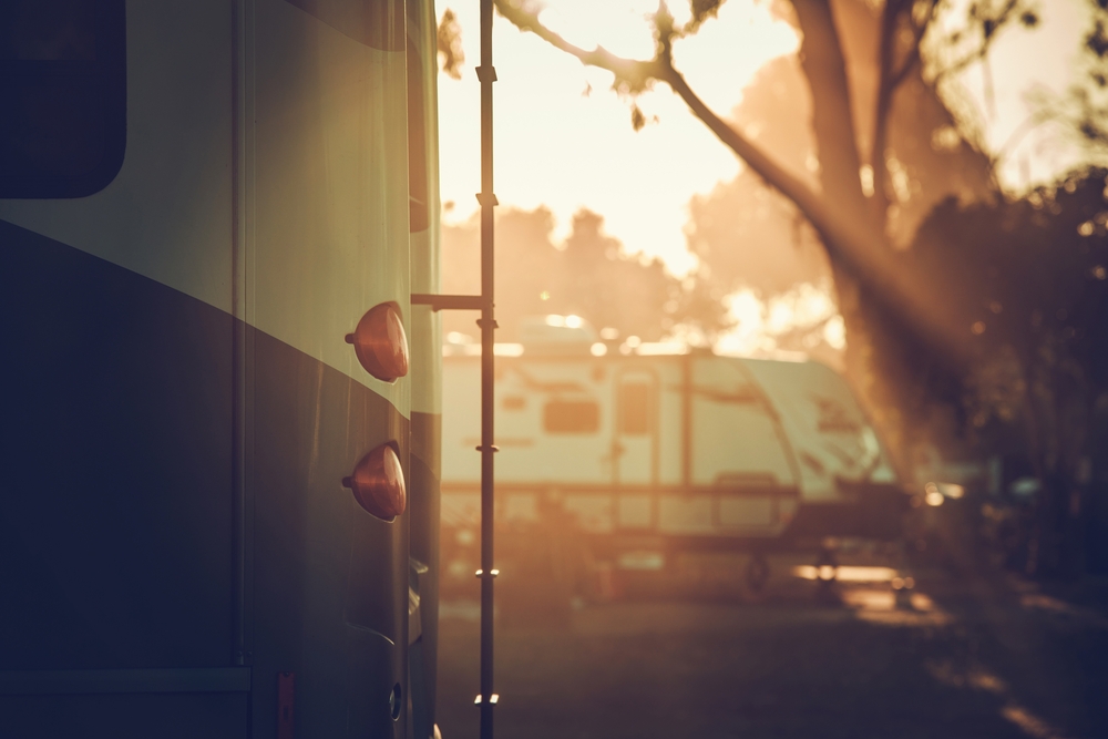  Rear Side of a Motorhome . Other RVs in the Background in an article about camping in Iowa