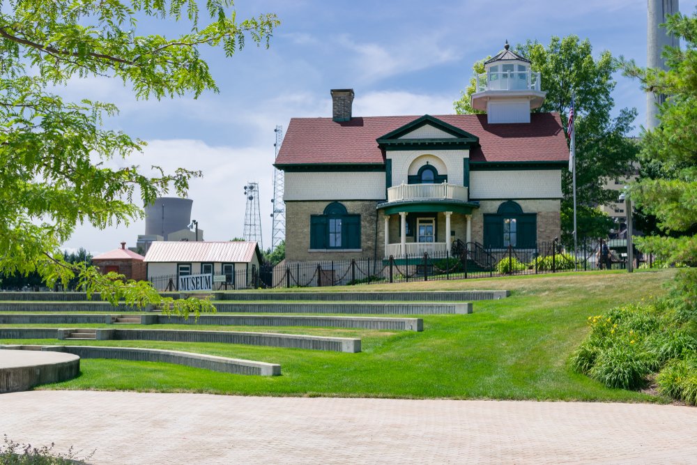 The lighthouse musuem is one of the the things to do in Michigan City. Washington Park LightHouse Museum in Millennium Park Bathed in Bright Sunlight during Midday on a Beautiful Summer evening on Lake Mighigan.