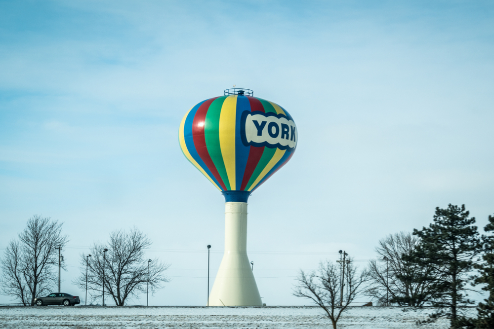 The water tower in York Nebraska, which has been painted to look like a hot air balloon, in the middle of the winter. 