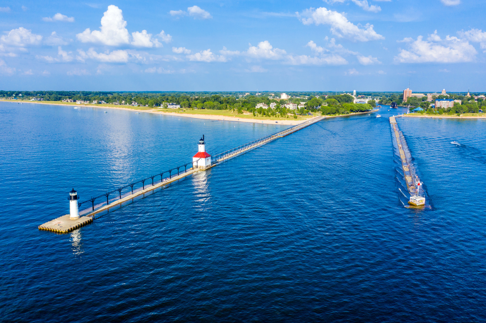 Aerial view of the piers jutting into Lake Michigan with St. Joseph in the background.