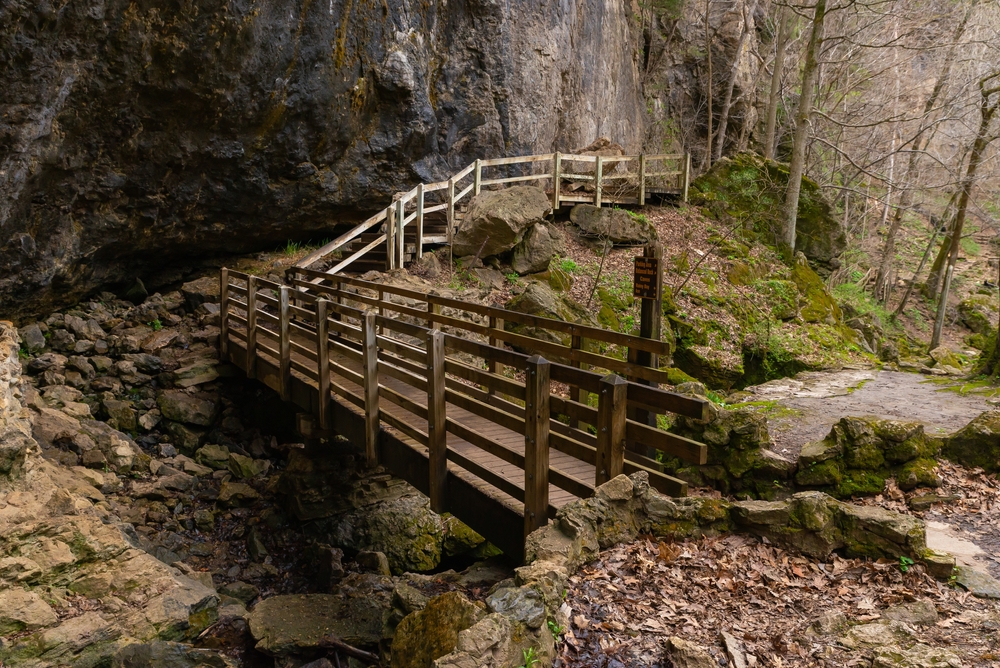 Wooden walkway along the cave walls  hiking in iowa