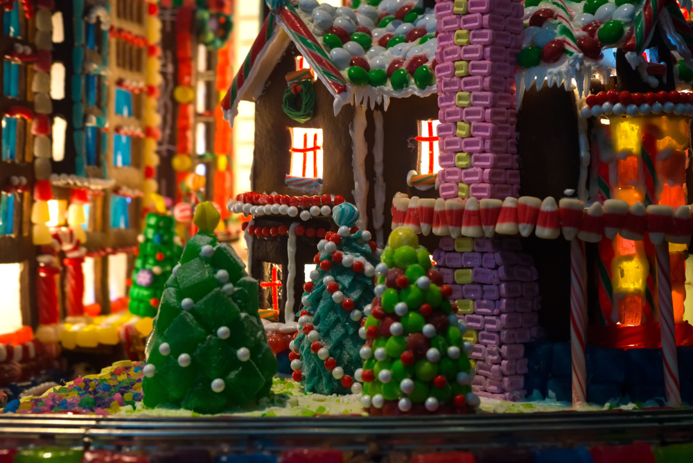 A close up of an elaborate Christmas gingerbread village