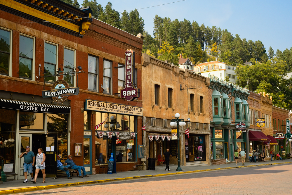 Historic saloons, bars, and shops on Main St Deadwood. It's an historic town that looks like the Wild West.  