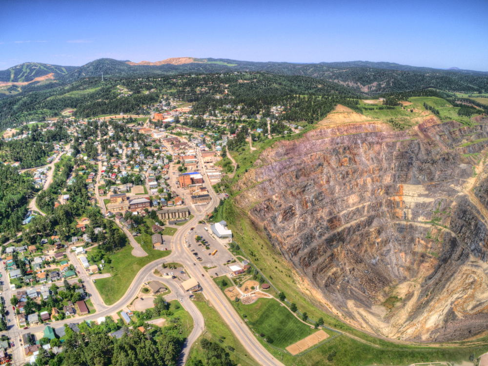 The town of Lead from above showing houses and a quarry   