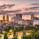 Sunset photo of things to do in Akron with illuminated cities.