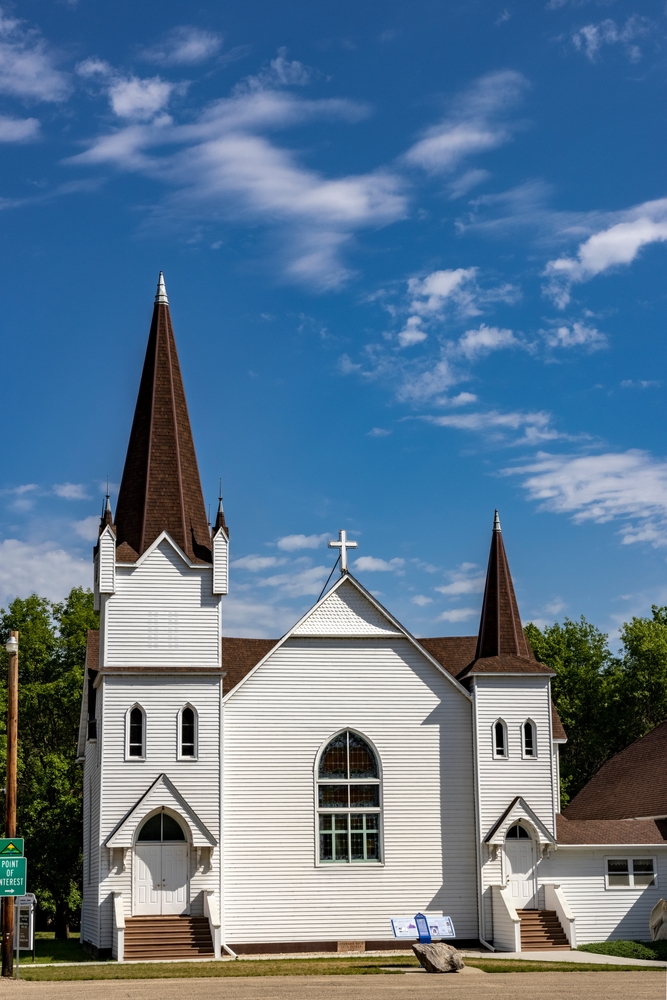 A historic white, wood church in Fort Ransom, North Dakota.