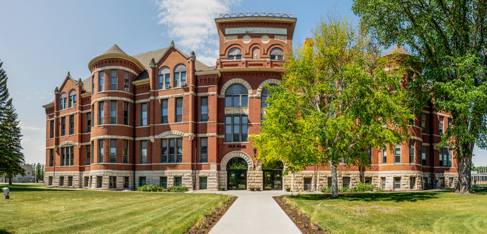 Large ornate red brick building in a town in North Dakota