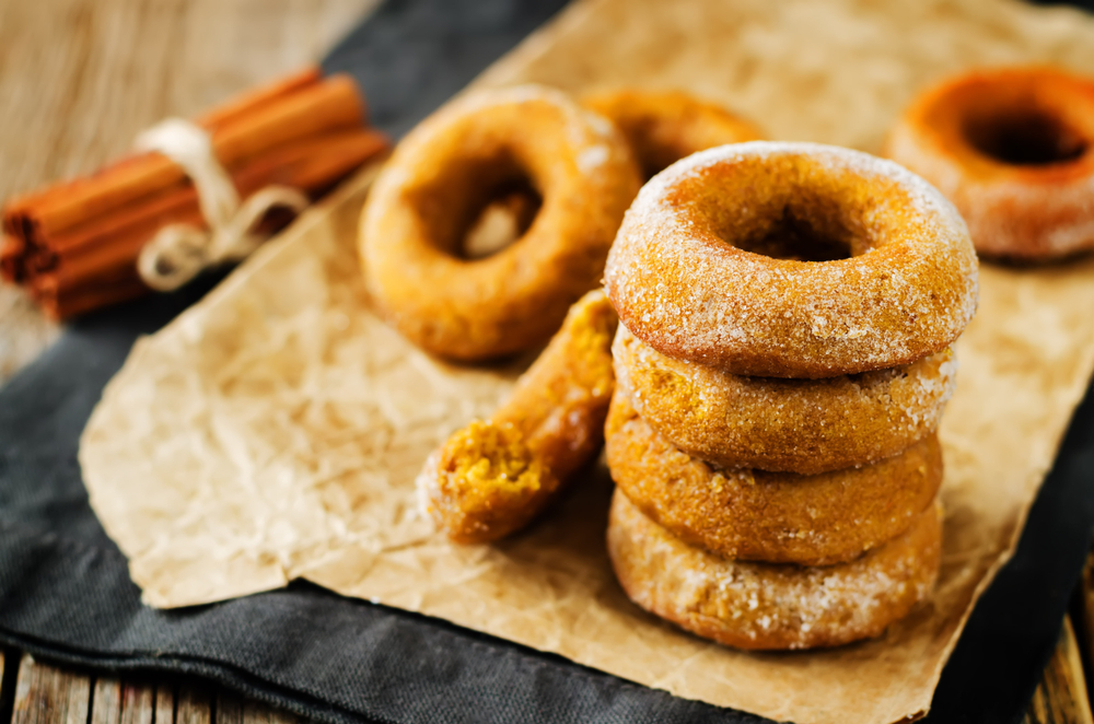 Stack of pumpkin donuts.