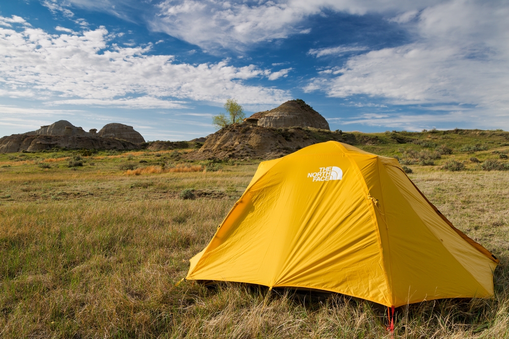  A yellow tent set up after hiking in the backcountry of Theodore Roosevelt National Park