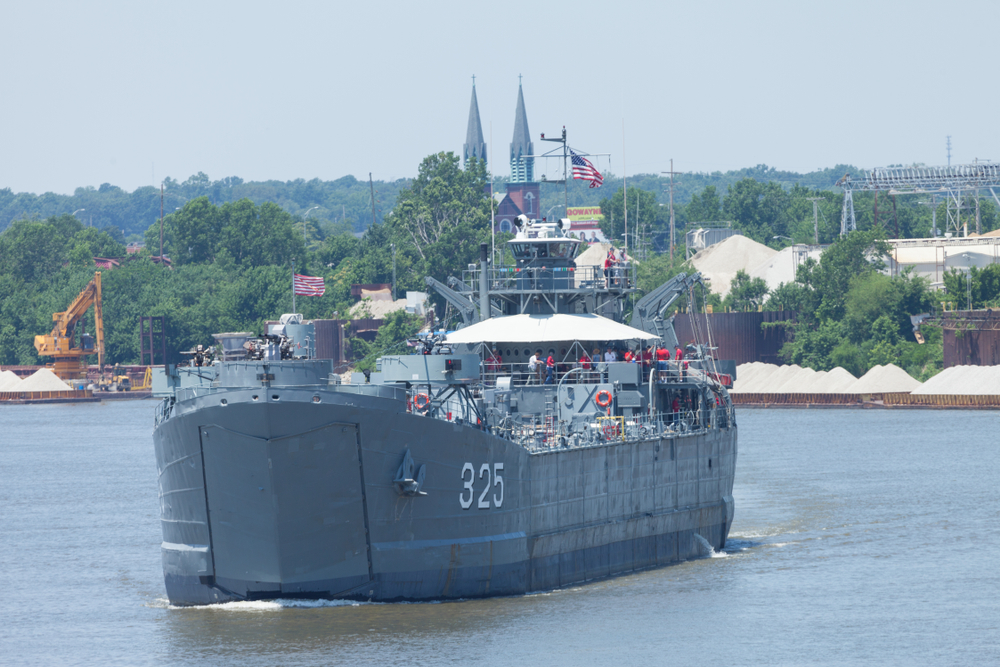 Evansville, Indiana, USA - June 25, 2016: Shriners Fest Air Show, USS LST-325 world war two tank landing ship performing manuvers in the ohio river during the airshow