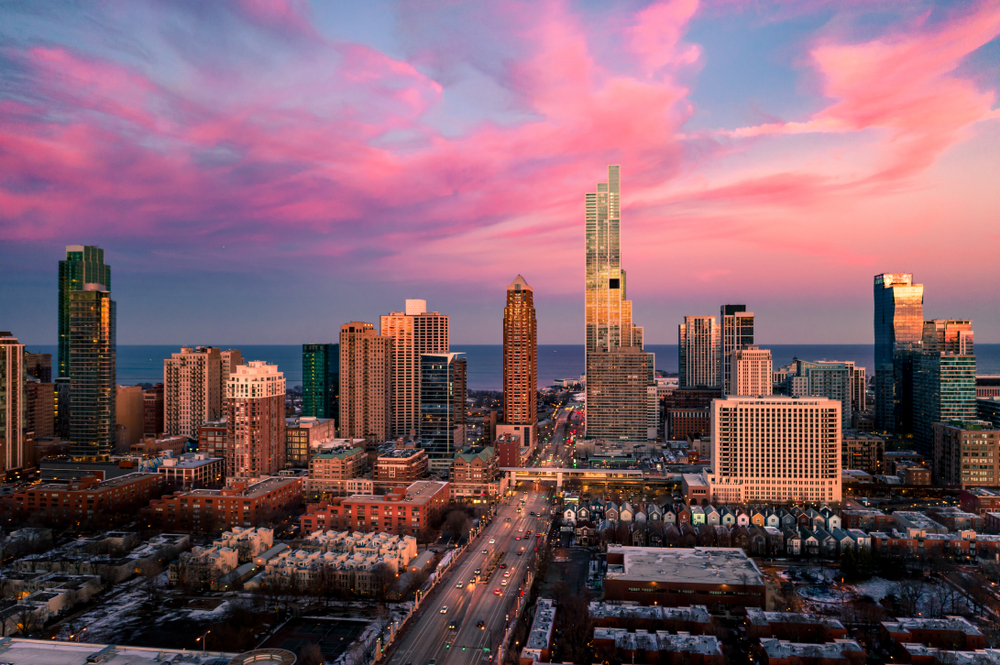 Aerial view of the South Loop district facing toward the lake at sunset.