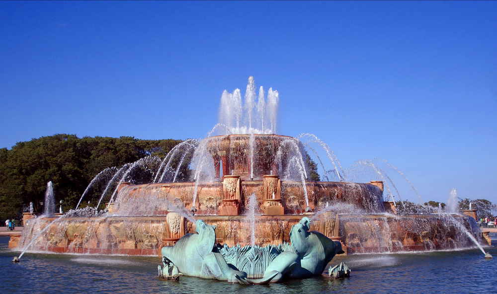 the elegant Buckingham Fountain with water coming from it and ornate sculptures
