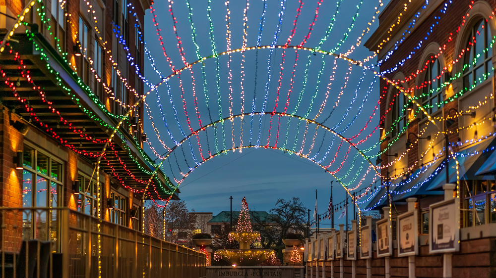 Tunnel of rainbow Christmas lights in downtown Naperville, Illinois.