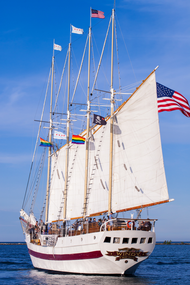 The Windy tall ship with its sails out on Lake Michigan.