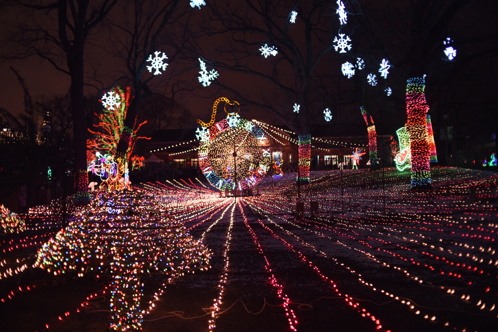A pretty light display with a clock and snowflakes at ZooLights in Chicago.