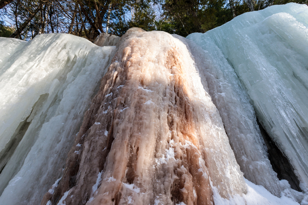 Ice curtain formed in winter from waterfall
