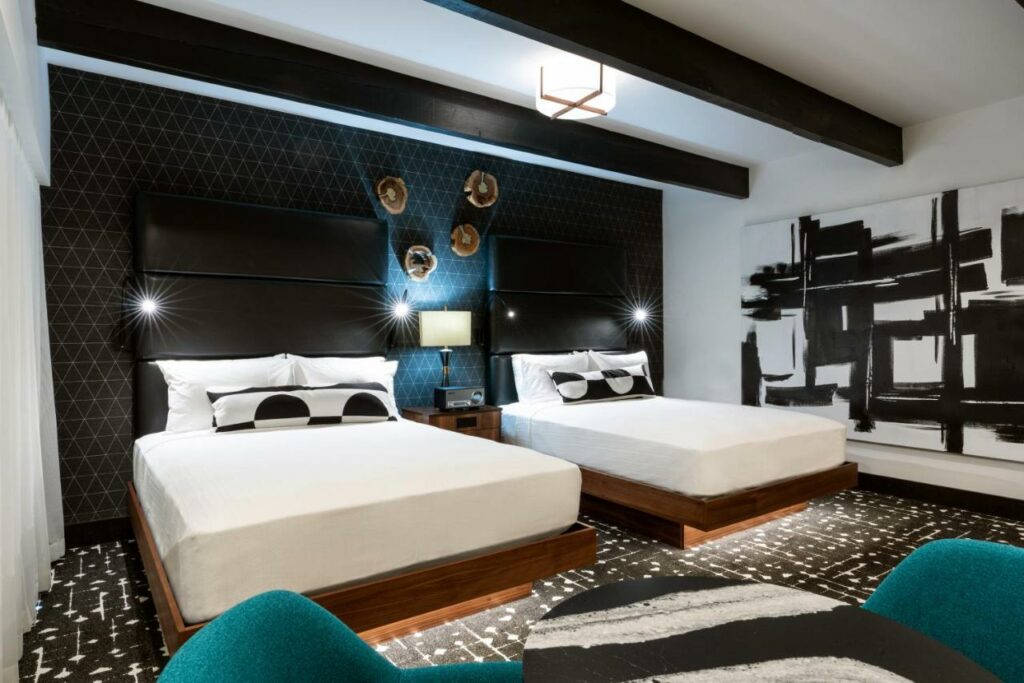 Modern and tasteful room at The Earl in Charlevoix with black and white furnishing.