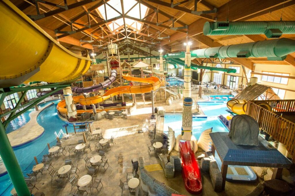 Looking down at an indoor waterpark in one of the best resorts in Ohio
