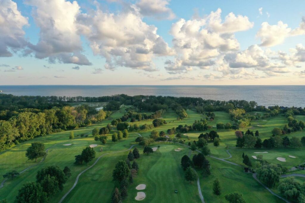 The view of a golf course and nature preserve along the shores of Lake Erie