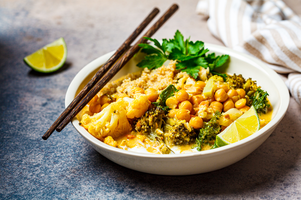 Vegan chickpea curry with cauliflower, broccoli, kale and quinoa