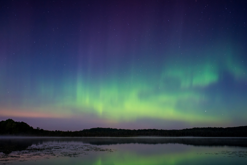 The northern lights, aurora borealis over a lake in Wisconsin.