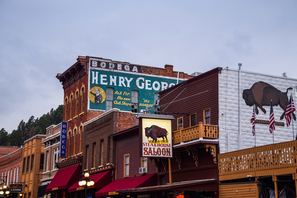 Exterior of the Buffalo Bodega Complex with historic storefronts on Main Street.