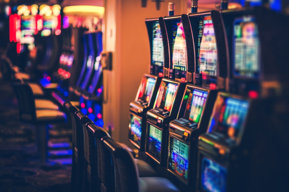 Row of slot machines at a casino.