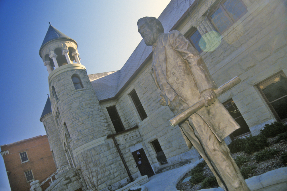 A statue of a man outside of the Western Heritage Center, one of the best things to do in Montana.