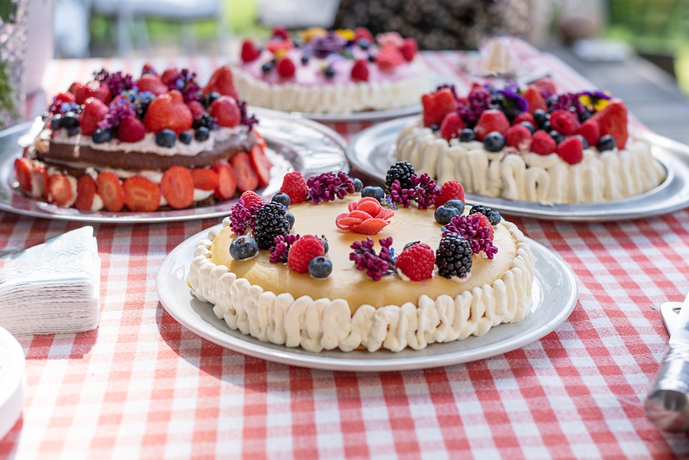 A table with a variety of different strawberry themed desserts at one of the best festivals in ohio