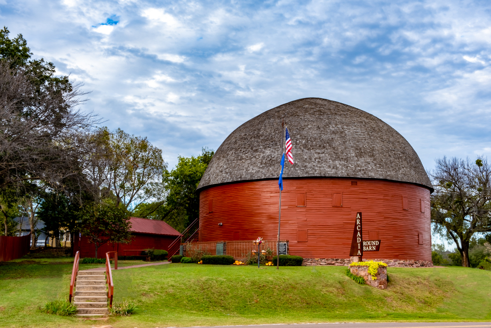 round barn with arcadia signboard towns in oklahoma