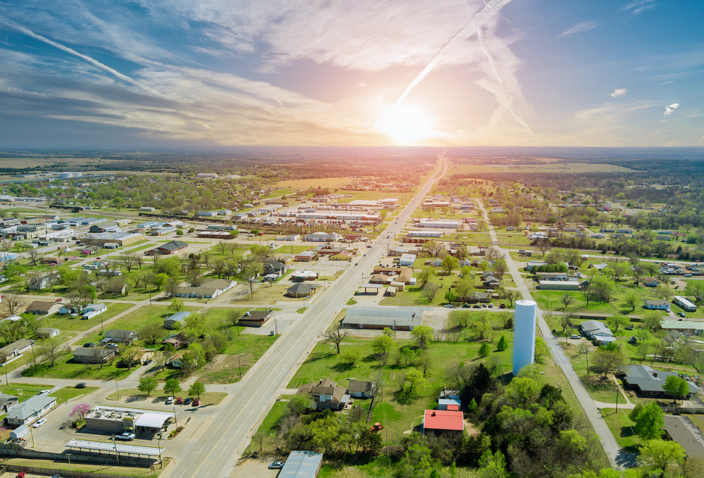 aerial view of a town during sunrise towns in oklahoma