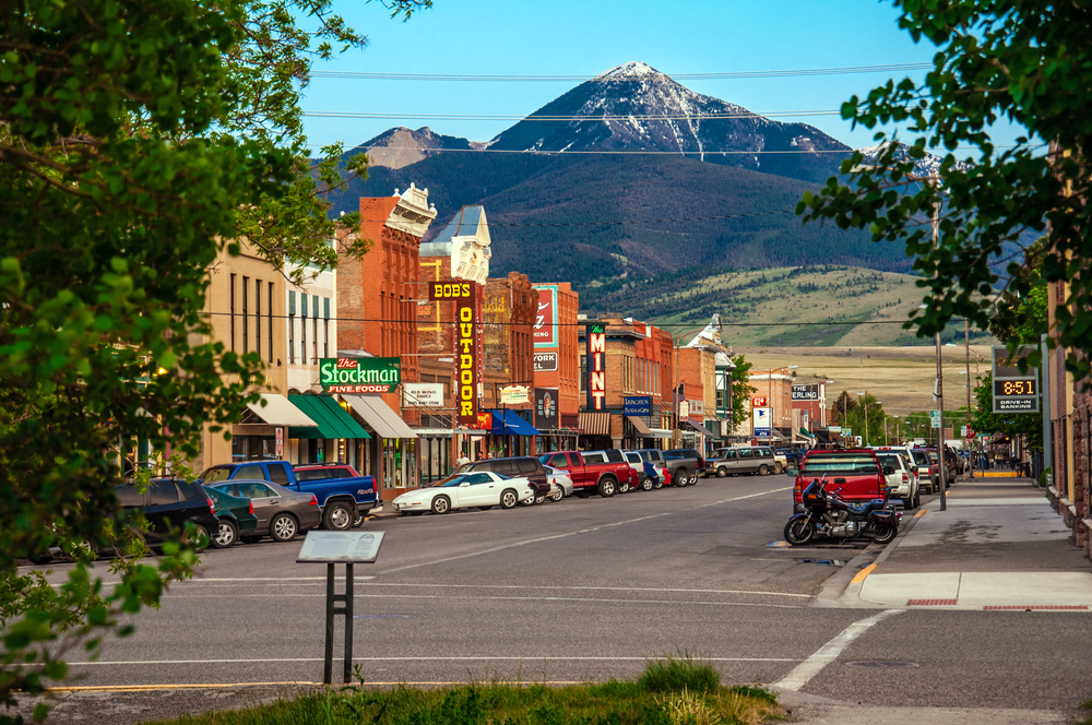 Historic downtown with a tall mountain peak in the distance.