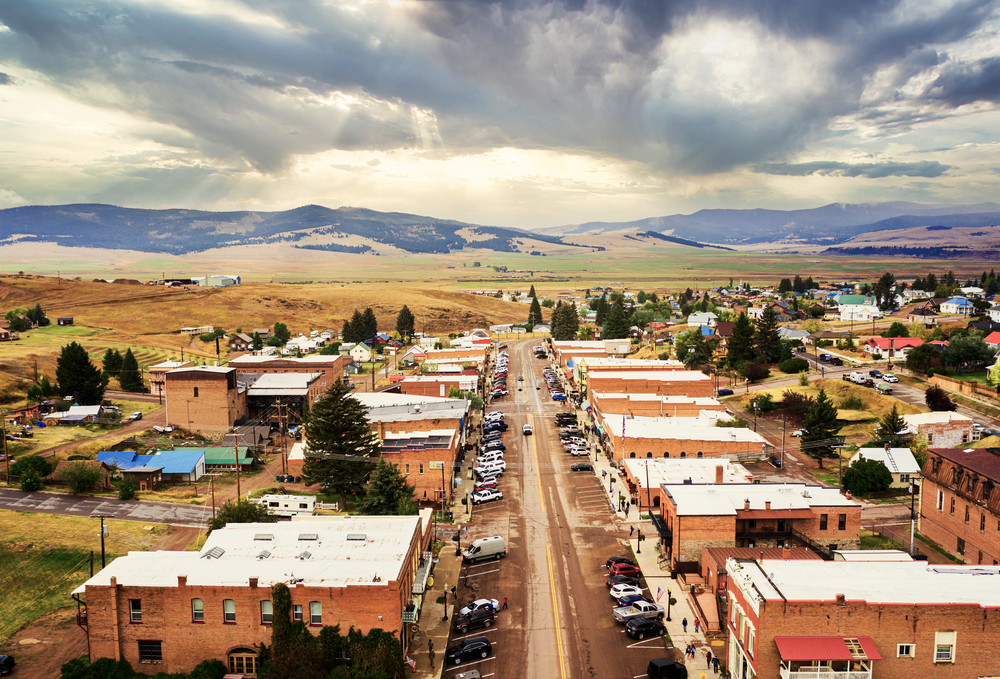 Aerial photo of Philipsburg showing downtown and mountains in the distance.